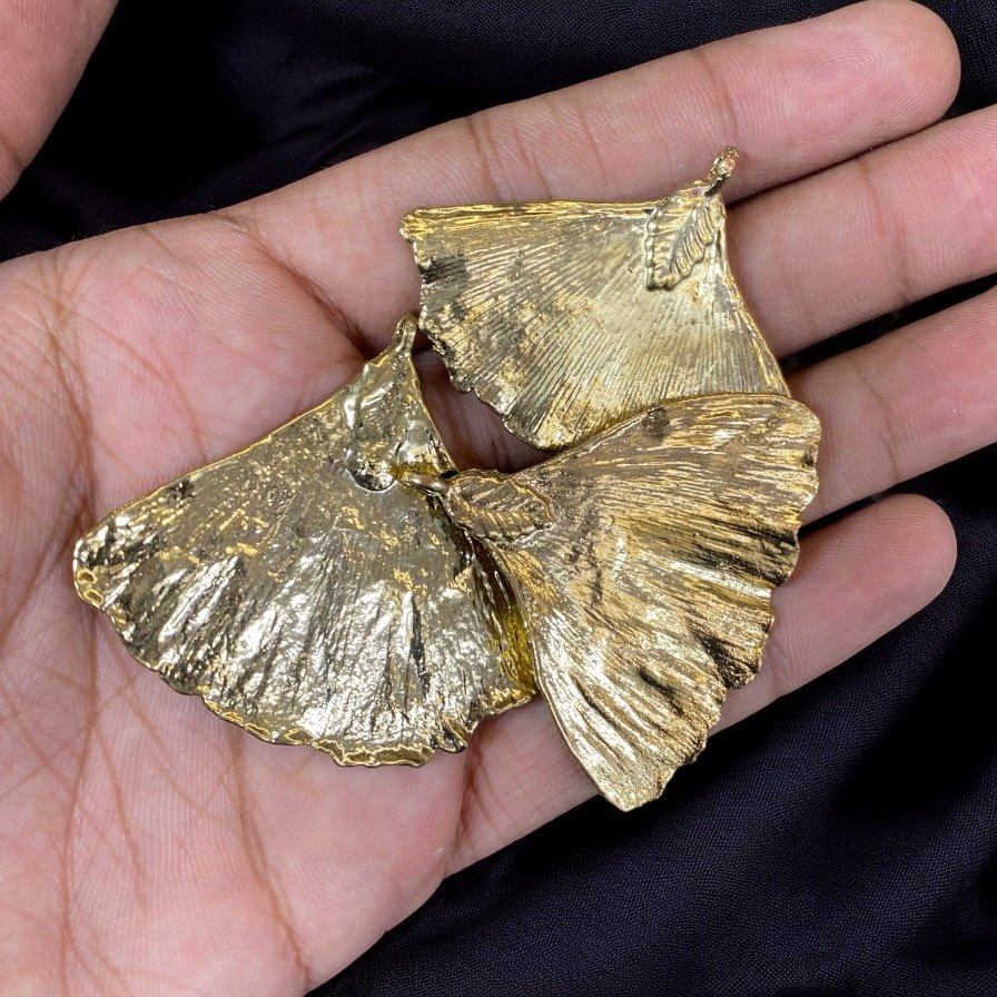 Arcasanta Leaf Charm in Gold | Premium Imitation Jewellery Quantity - 1